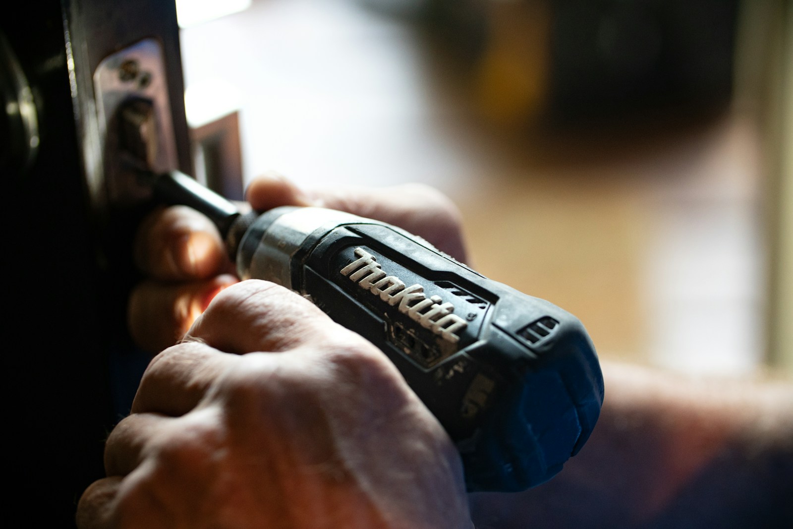 a person using a screwdriver